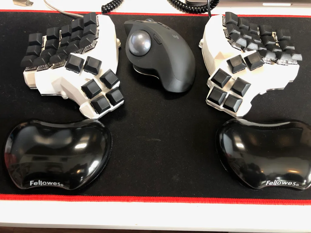 Ergonomic split keyboard with wrist rests