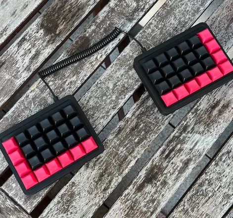 Let’s Split black 3D‑printed case